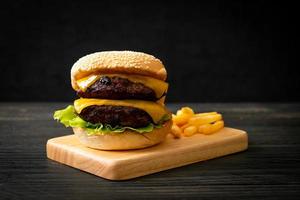 hamburger or beef burgers with cheese and french fries photo