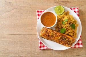 masala rice with salmon tandoori photo