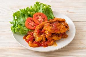 Fried fish topped with 3 flavors chili sauce photo