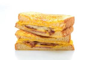 French toast ham bacon cheese sandwich with egg photo