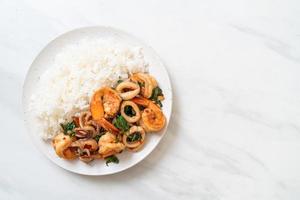 rice and stir-fried seafood with Thai basil photo