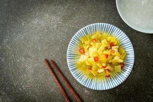 spicy salad pickle cabbage or celery with sesame oil photo