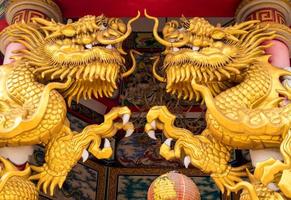Gold dragon statues in Chinese religious venues