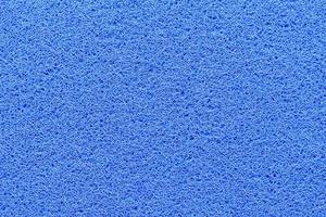 The blue PVC carpet made from plastic.