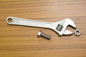 Wrench and hex bolt and hex nut photo