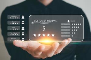 User give rating to service experience on online application, Customer review satisfaction feedback survey concept, Customer can evaluate quality of service leading to reputation ranking of business. photo