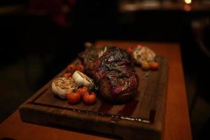 Juicy Beef Steak Wooden Board photo