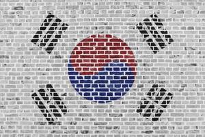 bandera de corea del sur pintada en una pared de ladrillos foto