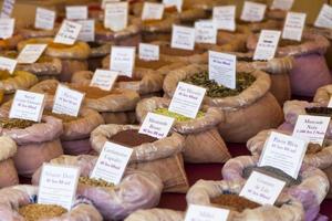 Bag of spices on a market stall photo