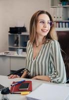 Young woman working on a computer photo