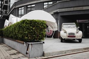 Minsk, Belarus, May 2022 - retro car near a street cafe photo