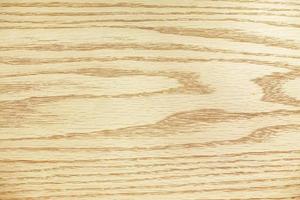 Beautifully patterned wooden background, light brown. photo