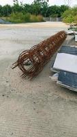 Wire mesh rusted. Prefabricated steel grating for concrete reinforcement. Building materials. photo