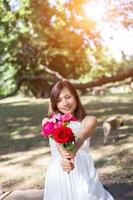 Flowers in woman hand photo