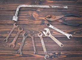 Tools on wooden table photo