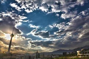 Sun setting in Tehran, High contrast unrealistic HDR photo