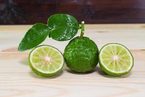 fresh fruits bergamot on wood table. photo