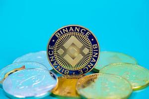 Binance Coin BNB group included with Crypto currency coin Dogecoin DOGE, bitcoin BTC, Ethereum ETH, Stellar XLM symbol Virtual blockchain technology future is money close up and Macro concept. photo