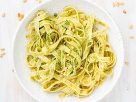 Tagliatelle pasta with pesto sauce made of Basil, garlic, pine nuts, olive oil