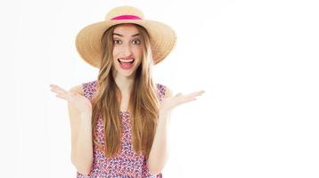 Portrait of a happy cheerful blonde girl in summer hat isolated over white background photo