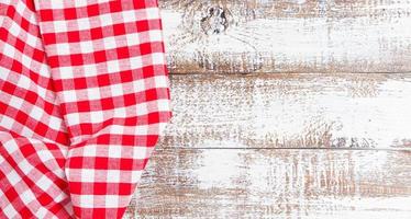 top view - tablecloth on empty wooden table photo