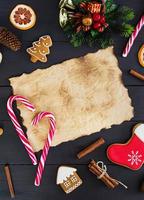 Christmas sweets, ginger cookies on wooden background. Christmas background photo