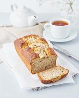 Banana bread, cake with banana, side view, vertical. The morning Breakfast with tea
