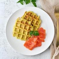 Zucchini waffles with salmon, fodmap diet top view photo