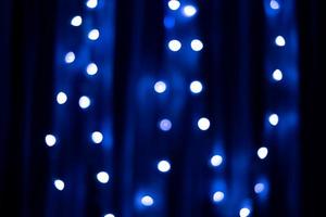 Abstract blue background  glitter lights. De focused. Wallpaper bokeh. photo
