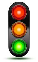 Traffic lights as found at vehicle intersections or road crossings isolated on white in sequence red, orange, green with black shroud. Traffic signal light with drop shadow. photo