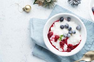 Christmas food, Vegan Coconut Rice Pudding, top view, copy space. photo