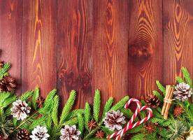 Christmas and Happy New Year dark brown background. Top view, copy space, wooden rustic photo