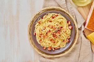 Carbonara pasta. Spaghetti with bacon, egg, parmesan cheese and cream sauce photo