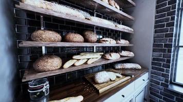 Fresh bread on shelves in bakery video