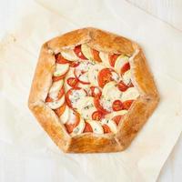 Step by step recipe. Homemade galette with vegetables, wholegrain pie. Top view photo
