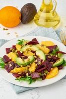 Vegan salad with beet curd avocado orange feta ricotta and pumpkin seeds, keto ketogenic