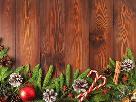 Christmas and Happy New Year dark brown background. Top view, copy space, wooden rustic table photo