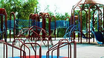 Empty swings on summer kids playground video