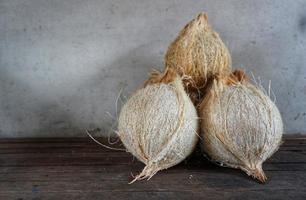 This old coconut will be processed by indonesian citizens into kueh or pudding etc. photo