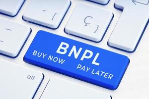 BNPL or buy now pay later message on computer Keyboard Key photo