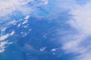 Flying over Thailand panoramic view of islands beaches turquoise waters. photo