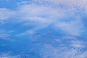 Flying over Thailand panoramic view of islands beaches turquoise waters. photo