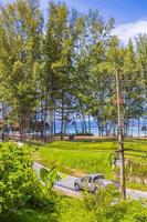 Nai Thon Naithon Beach view behind trees Phuket Thailand. photo