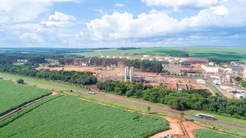 Sugar cane industrial mill processing plant in Brazil. Sugarcane plant producing renewable energy. Ethanol. photo