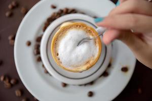 Woman drinking coffee table. Women in cafe. photo