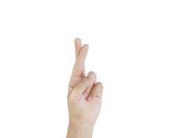 Close up Asian female15-20 age hand show two fingers rim light for lie and wishing, for good luck gesture, sign arm and hand isolated on a white background copy space symbol language photo