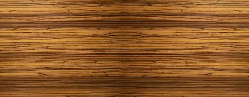 Dark Brown color wood wall material burr surface texture on black background Pattern Abstract wooden, top view scene photo
