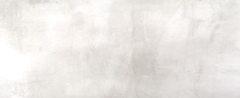 Paint white color on the Cement wall has gray color and smooth abstract surface texture concrete material background photo