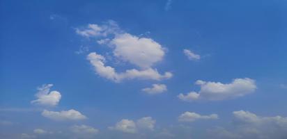 Cumulus white clouds in the blue sky natural background beautiful nature space for write photo