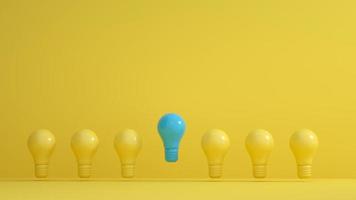 bombillas azules entre bombillas amarillas sobre fondo amarillo. conceptos de liderazgo, innovación, gran idea e individualidad. representación 3d foto